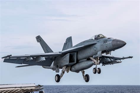 F/A-18E/F Super Hornet taking off from a runway